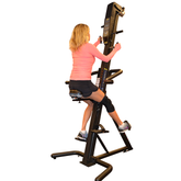 Woman Using VersaClimber SRM Sports Medical Seated
